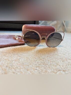 Miu Miu Round Cat-Eye Sunglasses in Mauve Pink